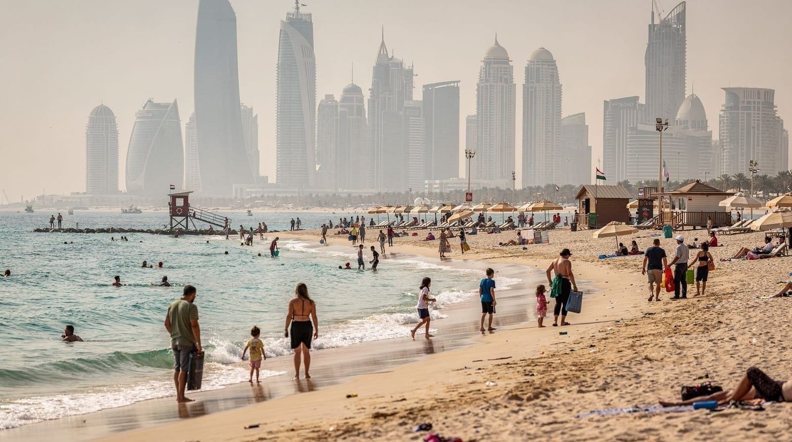 The Dubai beach day guide: where to go and what to know — Planning a Dubai beach day — public versus private beaches, dress norms, water s